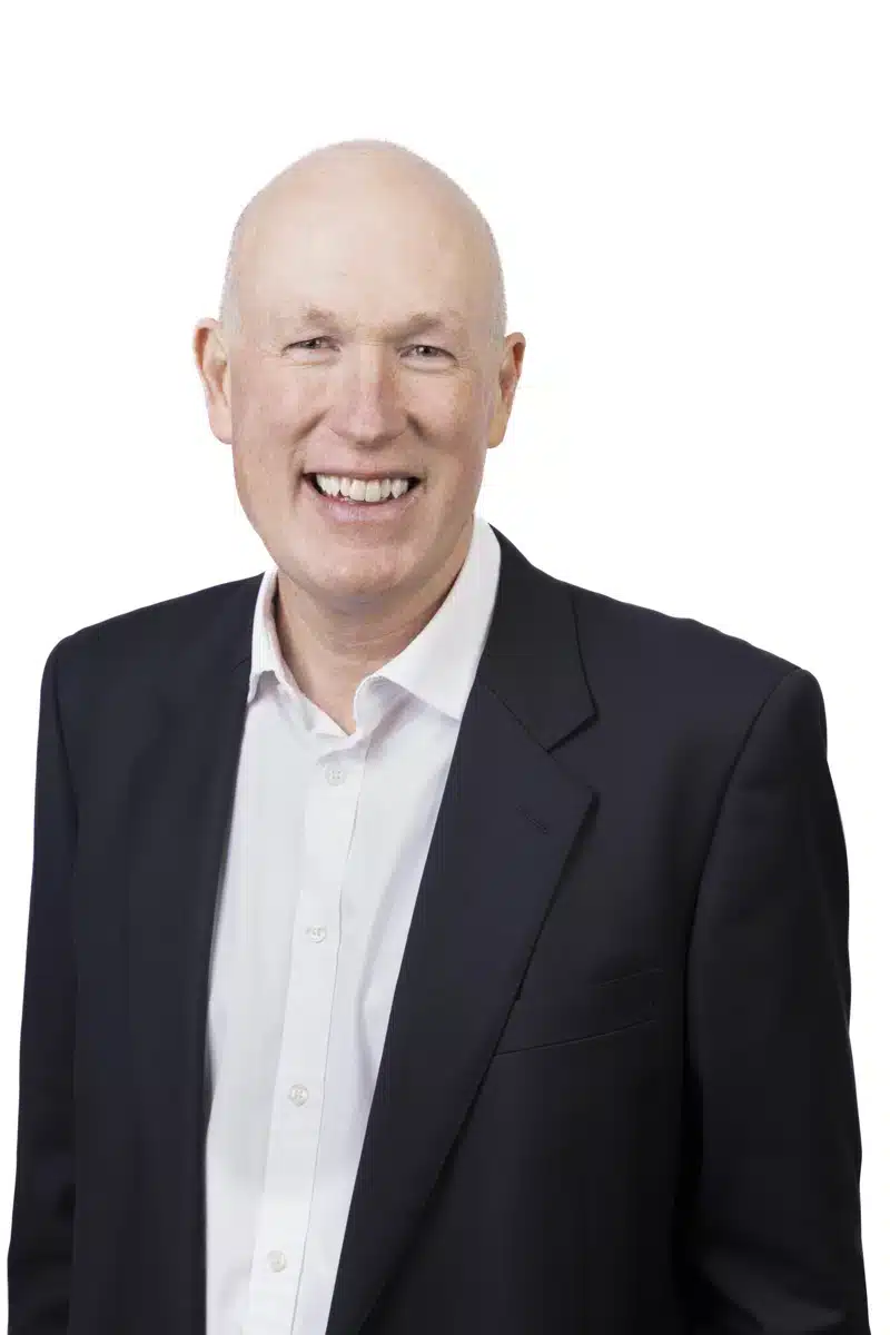 Headshot of Bernie Mclntosh, Principal of Apex Finance Brokers (AFB), smiling in a professional setting.