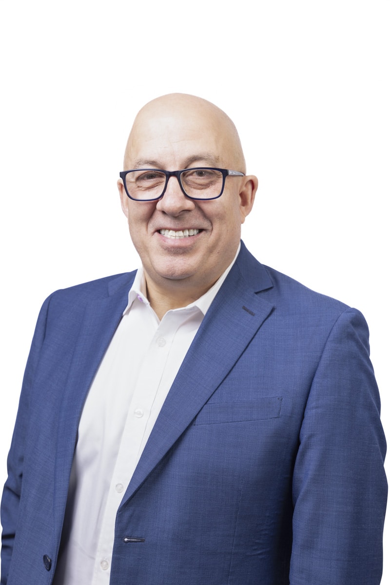 Headshot of Glen McKay, EGM - Distribution & Mortgage Operations at Apex Finance Brokers (AFB), smiling in a professional setting.